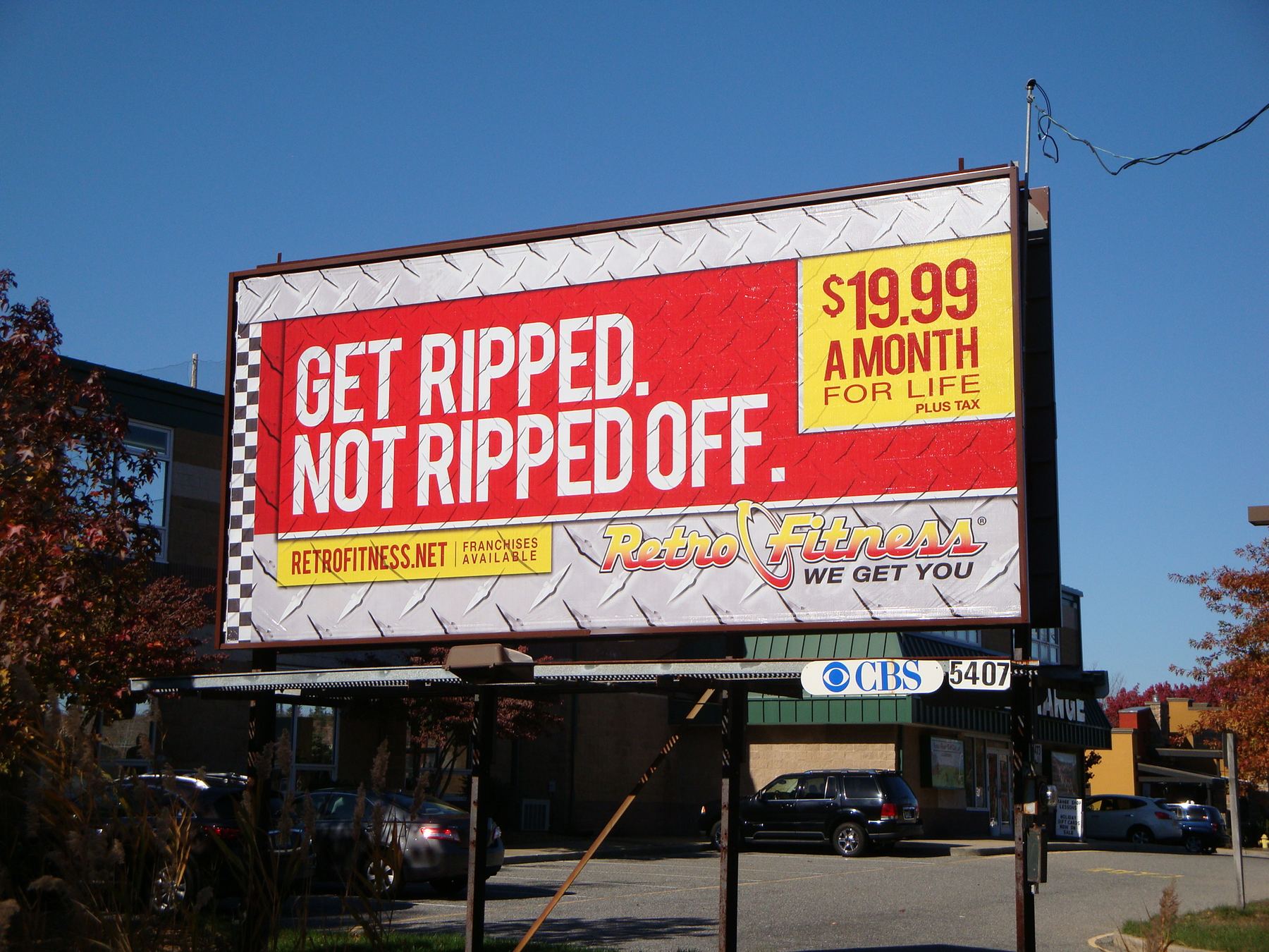 Retro Fitness billboard: Get ripped. Not ripped off.