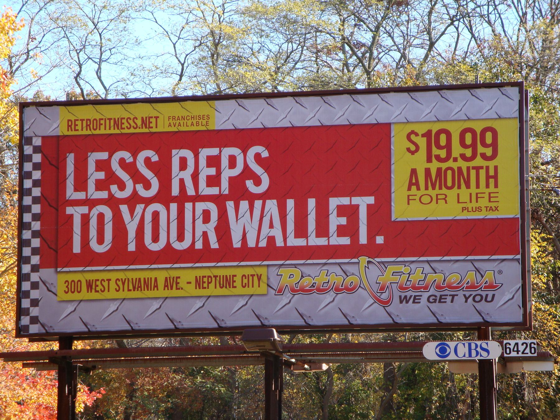 Retro Fitness billboard: Less reps to your wallet.